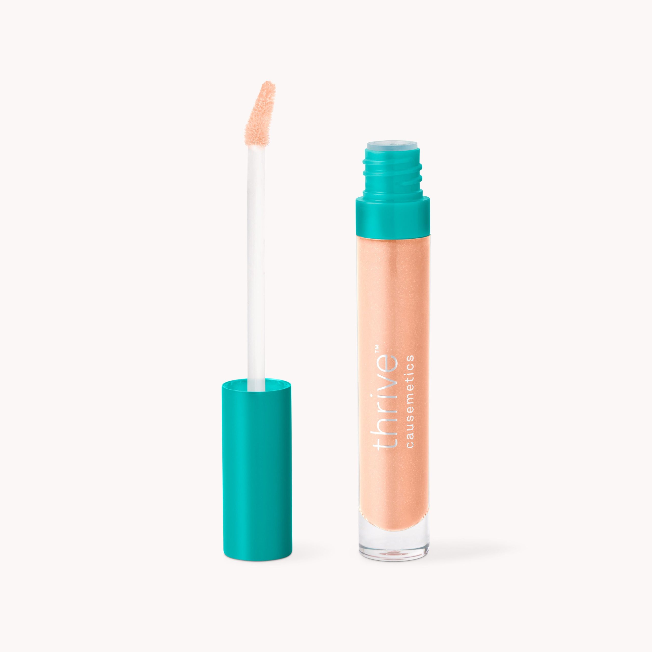 Sheer_Strength_Lip-Plumping_Peptide_Gloss_-_Emily.jpg